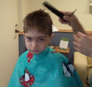 Simeon getting his haircut